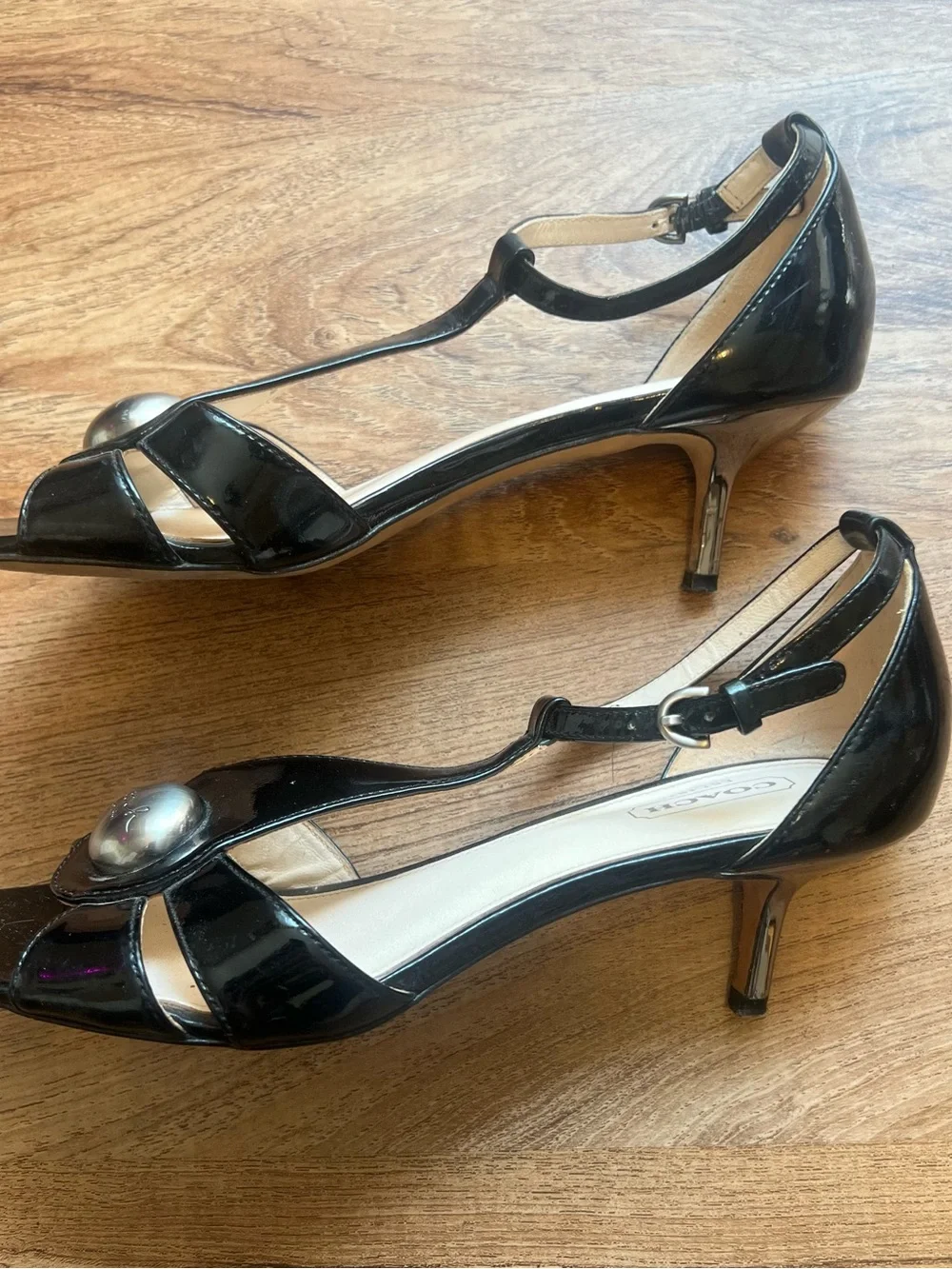 Vintage Coach Black Patent Leather T-Strap Heels with Silver Medallion